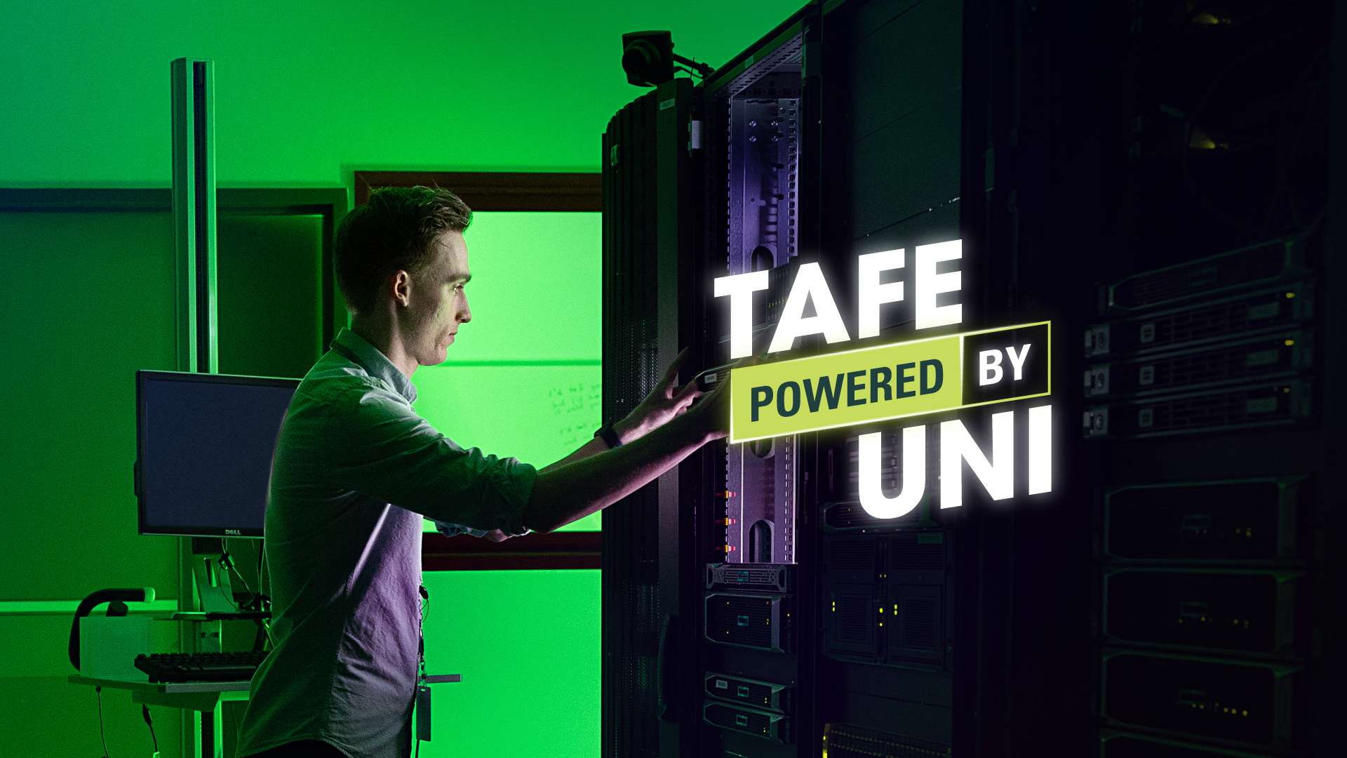 A CQU TAFE student inspects a server rack, the words TAFE powered by Uni are overlayed.