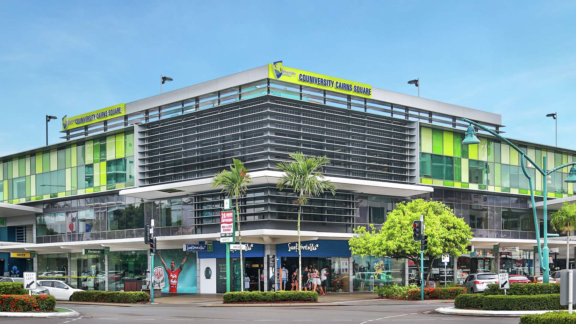 An exterior view of the modern CQU Cairns Square Campus building in Queensland on a clear day