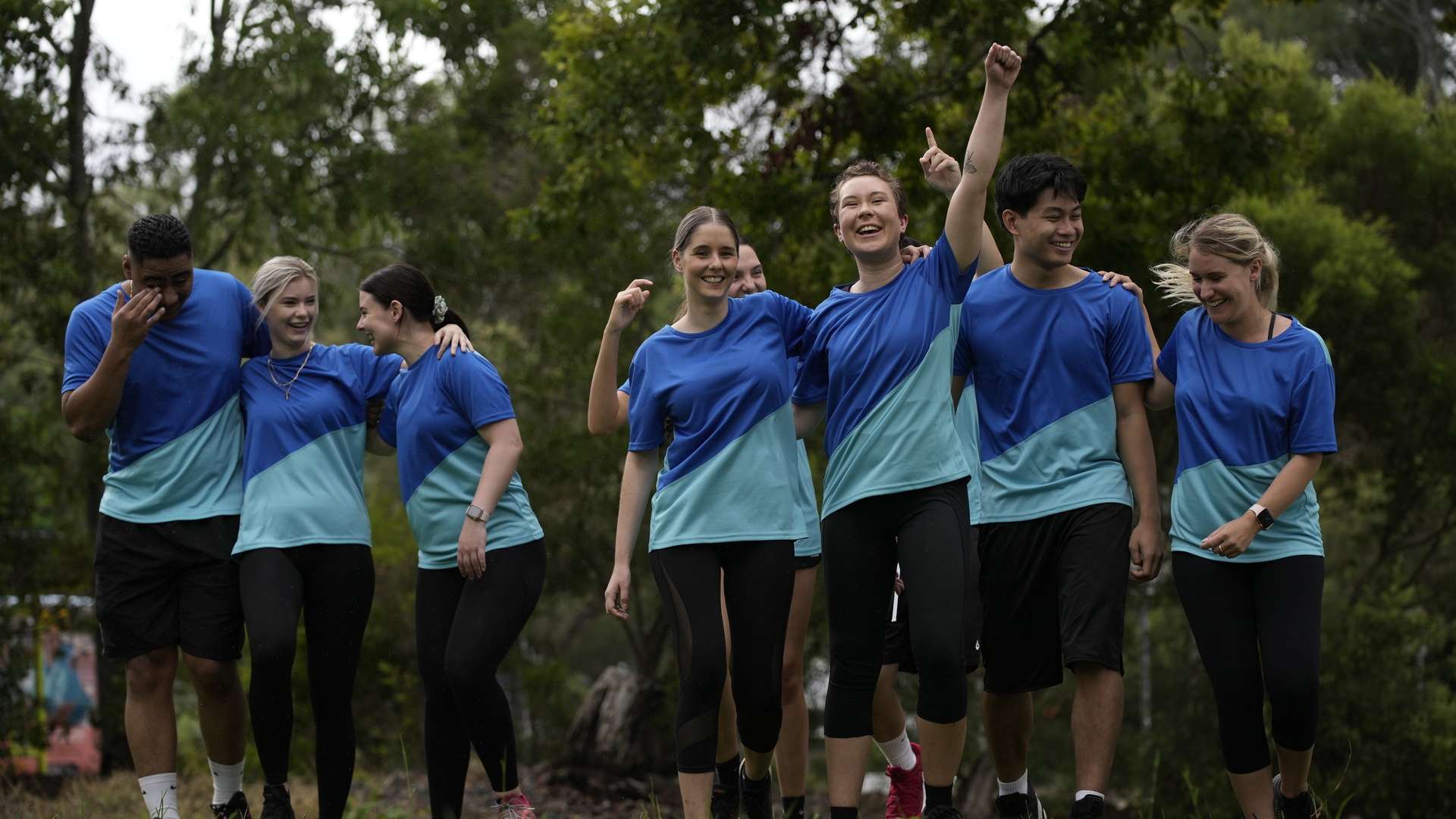 A group of Rockhampton students in a team cheering.